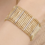 AMAYA - Brazalete en Oro Amarillo y Blanco con Diamantes